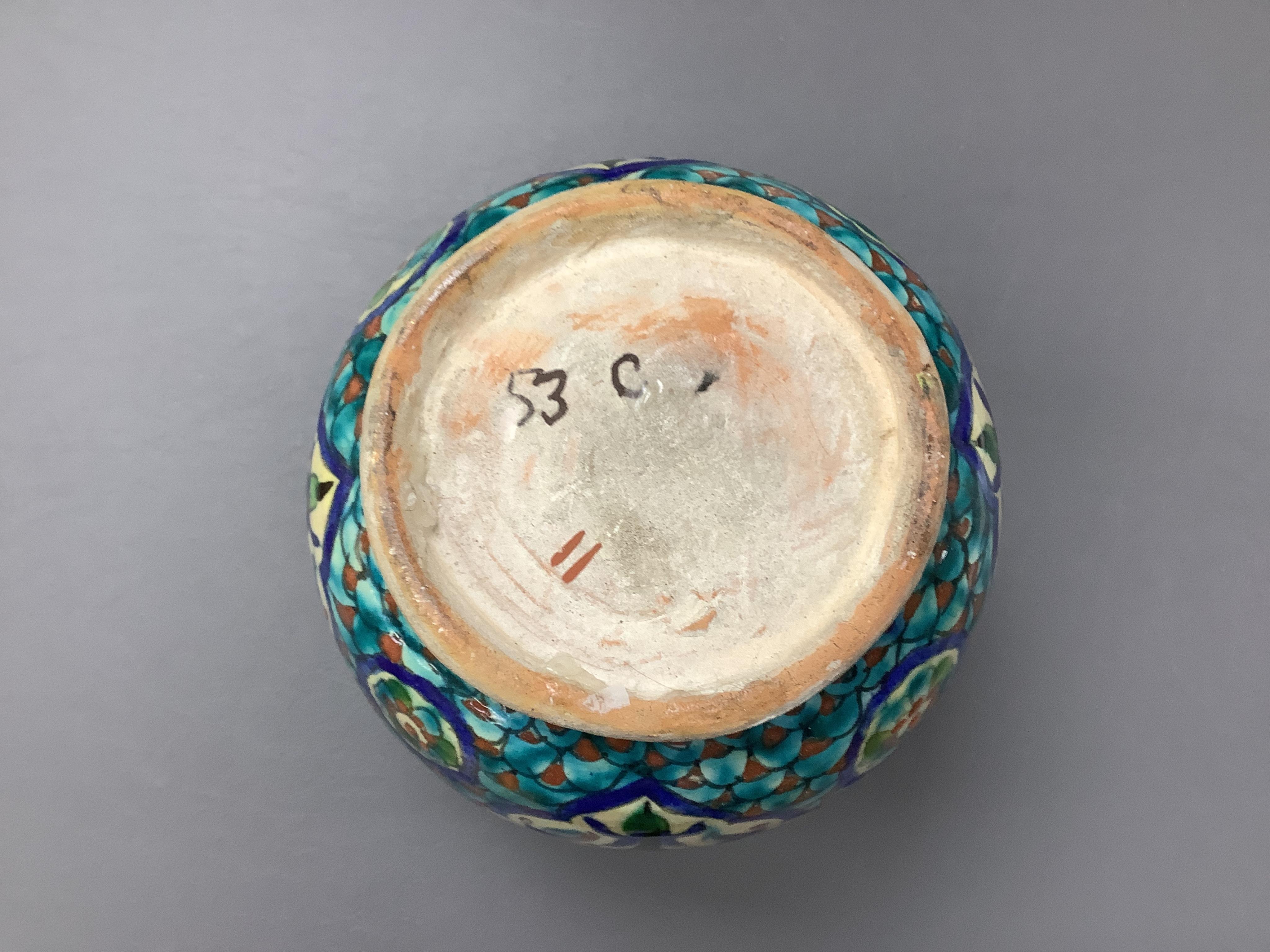 Two Persian vases and a mug, decorated with stylised flowers together with a Laroche Belgium Persian style vase, tallest 28.5cm. Condition - fair to good